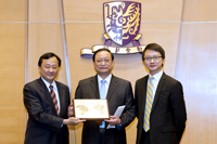 Visit of Mr. Wang Guoqiang (middle), Vice Minister of the National Health and Family and Planning Commission and Commissioner of the State Administration of Traditional Chinese Medicine